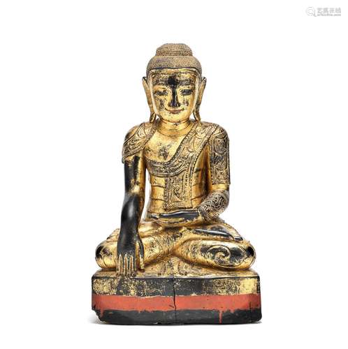 A GILT AND LACQUERED WOOD FIGURE OF BUDDHA