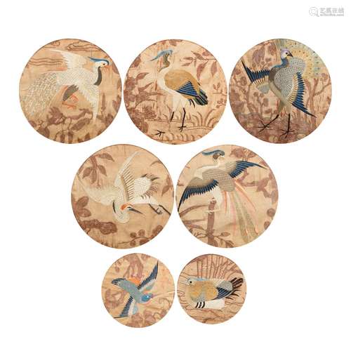 A GROUP OF SEVEN SILK EMBROIDERED CIRCULAR 'BIRD' PANELS