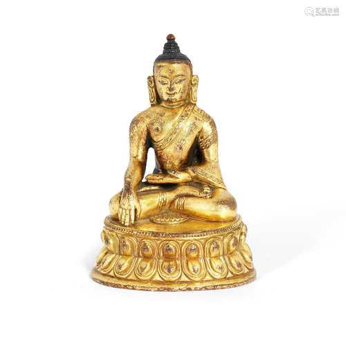 A GILT BRONZE FIGURE OF BUDDHA SHAKYAMUNI