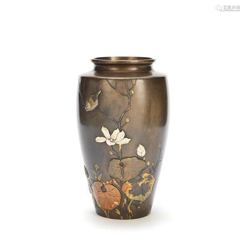 A BRONZE AND MIXED METAL VASE