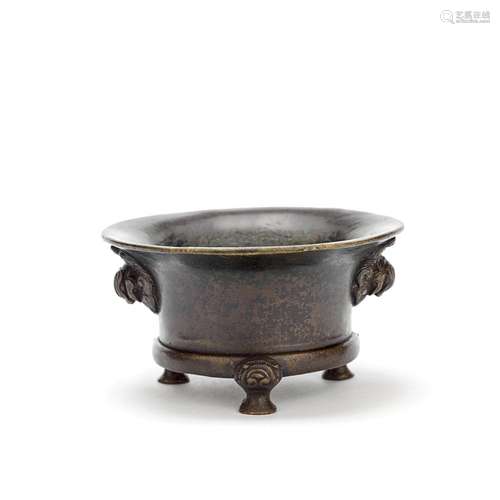 A BRONZE TRIPOD INCENSE BURNER