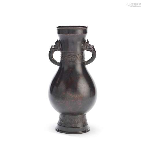 A BRONZE PEAR-SHAPED VASE