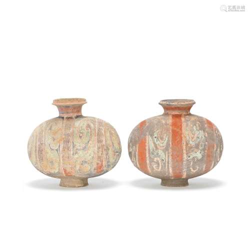 A PAIR OF PAINTED POTTERY 'COCOON' JARS