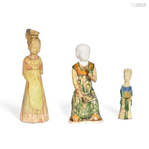 A GROUP OF THREE POTTERY LADIES