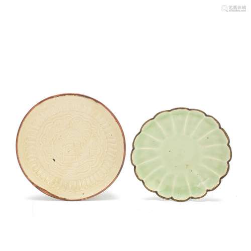 A SMALL LONGQUAN CELADON-GLAZED DISH AND A MOULDED DING SAUC...