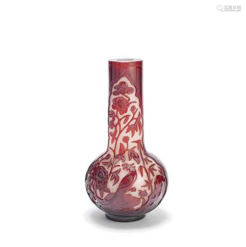 A RED OVERLAY ON SNOWSTORM GLASS BOTTLE VASE