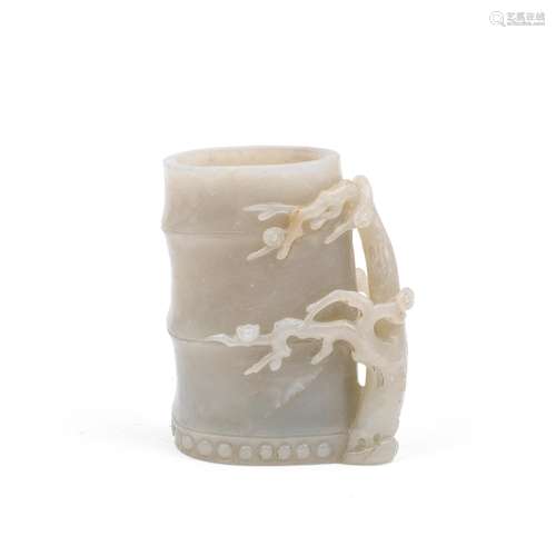 A PALE GREEN JADE BAMBOO-FORM VASE