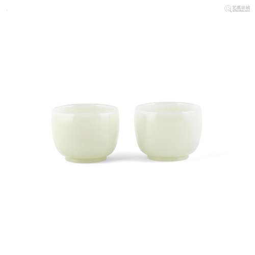 A PAIR OF PALE JADE CUPS