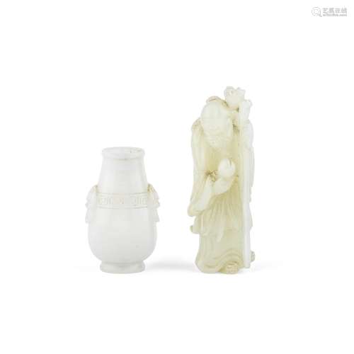 A PALE GREEN JADE FIGURE OF SHOULAO AND A WHITE JADE VASE