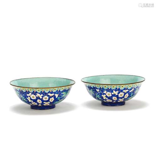 A PAIR OF PAINTED ENAMEL BOWLS