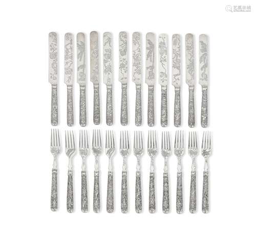 A SET OF TWELVE SILVER DESSERT KNIVES AND FORKS