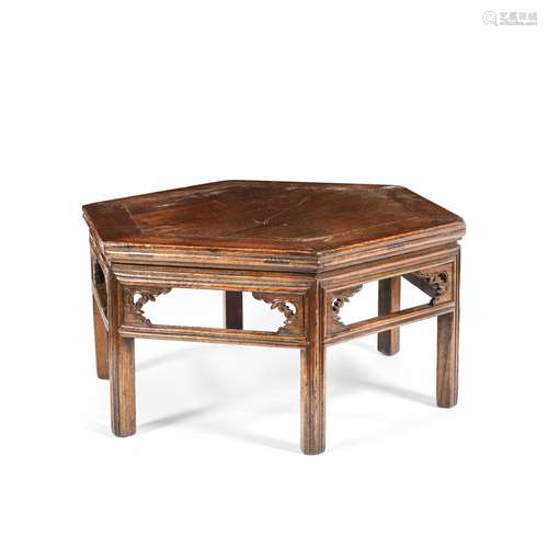 A HEXAGONAL ELMWOOD LOW TABLE