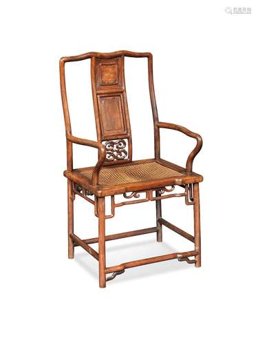 A HUANGHUALI YOKE-BACK ARMCHAIR