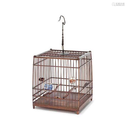 A HUALI BIRD CAGE WITH BIRD FEEDERS