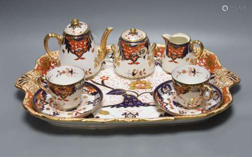 A Davenport Imari pattern tete a tete cabaret set, tray widt...