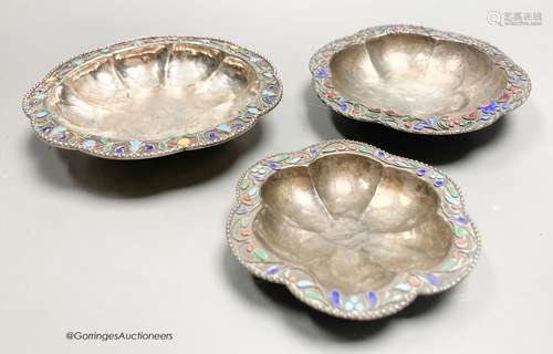 Three Persian white metal and cloisonne enamel small dishes,...