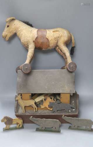 An early 20th century Steiff pull-along horse on wheels, boo...