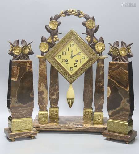 An Art Deco Brazilian onyx clock garniture, Marti movement c...