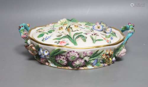 A Minton porcelain floral encrusted lidded pot pourri, mid 1...