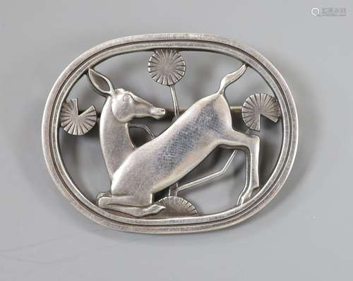 A Georg Jensen sterling oval kneeling deer brooch, no. 256, ...