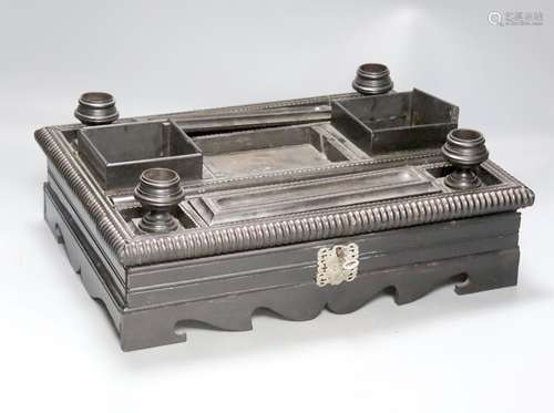 A 19th century Indo-Colonnial ebony desk stand, single drawe...