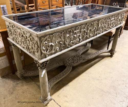 An 18th century style painted two drawer glass top console t...