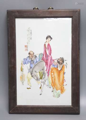 A Chinese framed poreclain plaque, painted with figures and ...