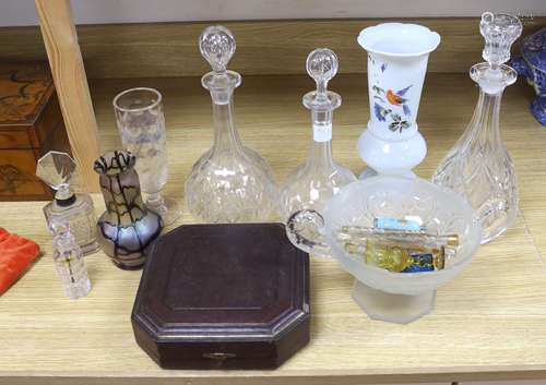 A collection of glass perfume bottles, three decanters, two ...