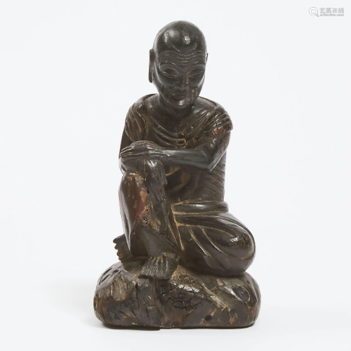 A Wood Carved Figure of a Luohan, 19th Century, ????