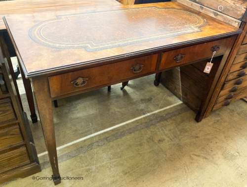 A George III style walnut two drawer writing table, W.122cm ...