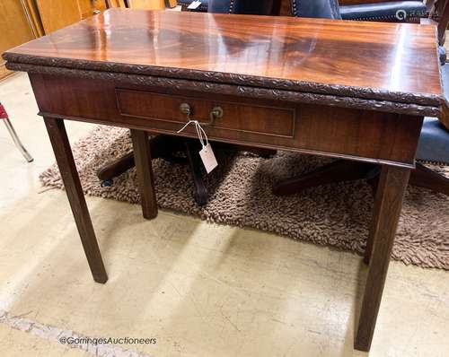 A George III rectangular mahogany concertina card table, W.9...