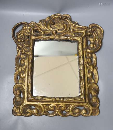 A 19th century gilt composition rectangular mirror in the Ba...