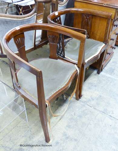 Two Edwardian mahogany tub frame salon chairs