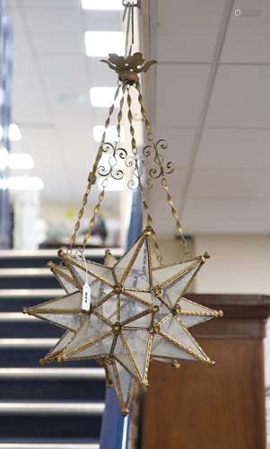 A gilt-metal star-shaped ceiling light, having etched plain ...