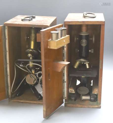 Two mahogany cased microscopes by C. Baker, London, with len...