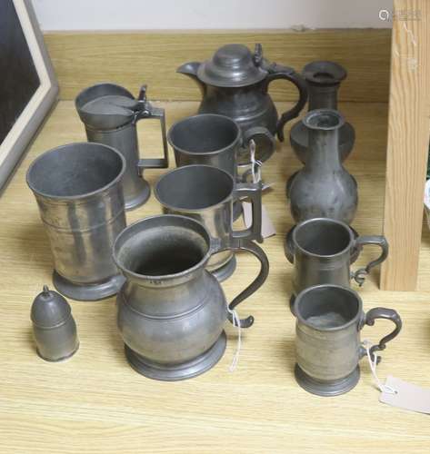 A group of 19th century French and British pewter mugs, meas...