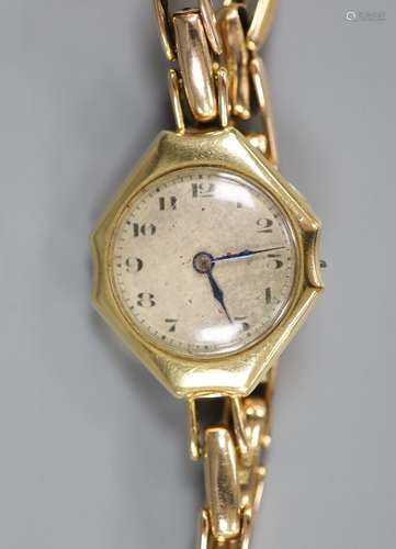 A lady's 18ct gold manual wind wrist watch(a.f.), on a 15ct ...