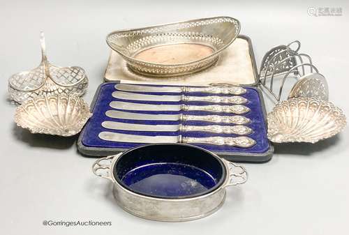 A George V silver two handled butter dish, with blue glass l...