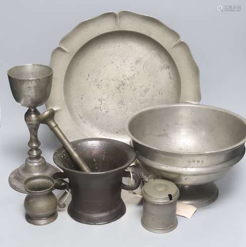 A pewter pedestal bowl, a barbed and crested dish, three oth...