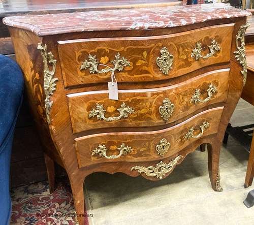 A Louis XV style marquetry inlaid marble top bombe commode, ...