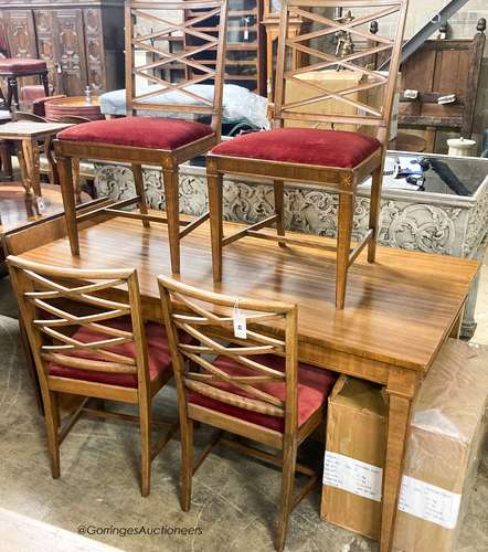 A Swedish walnut and beech dining suite comprising rectangul...