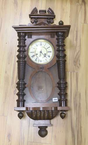 A 19th century Continental wall clock, in architectural waln...