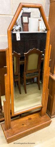 A French Art Deco beech cheval mirror, width 74cm, height 17...