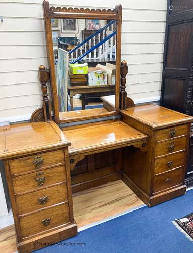 A late Victorian inlaid oak Aesthetic movement dressing tabl...