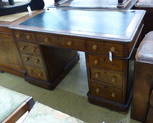 A late Victorian oak pedestal desk, length 122cm