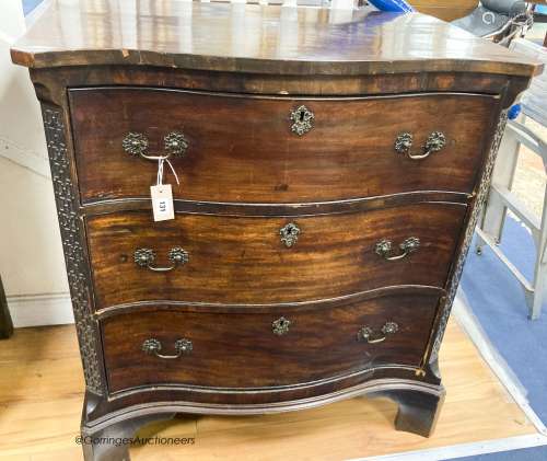 A George III style mahogany serpentine secretaire chest, wid...