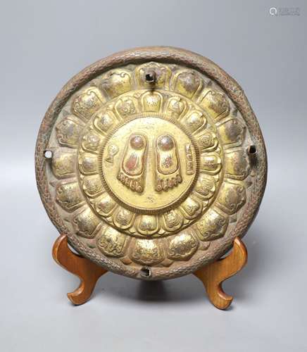 A Tibetan gilt bronze stand, inscribed in sanskrit, 26cm