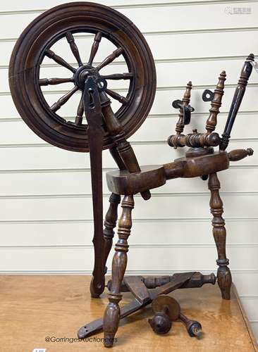 A 19th century beech and elm spinning wheel, height 92cm