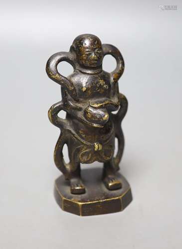 A 19th century Chinese bronze figure of a boy, 12cm