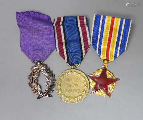 Three medals, including a Polish commemorative war medal (19...